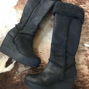 Tall black suede wedge boot. Never worn. No box.